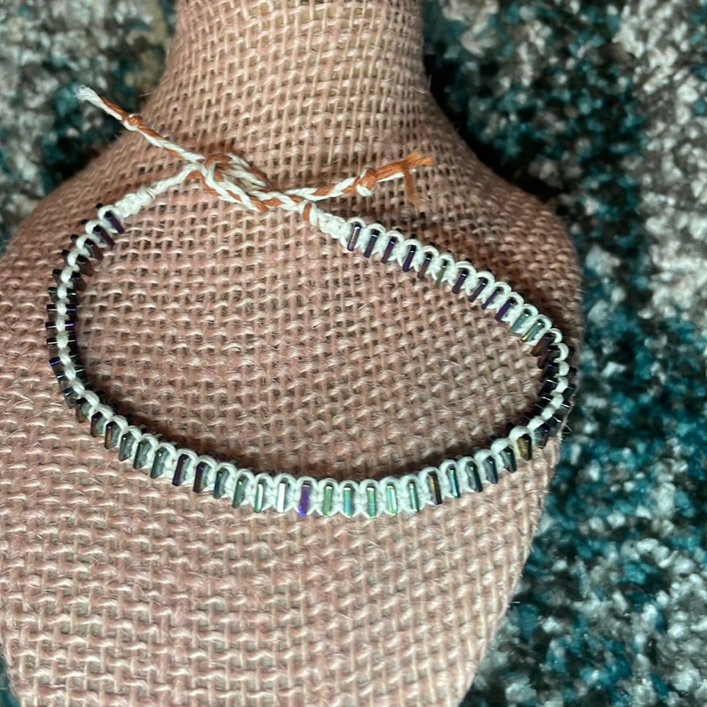 Handmade bracelet anklet tie on natural hemp white metal beads irredentist purpl